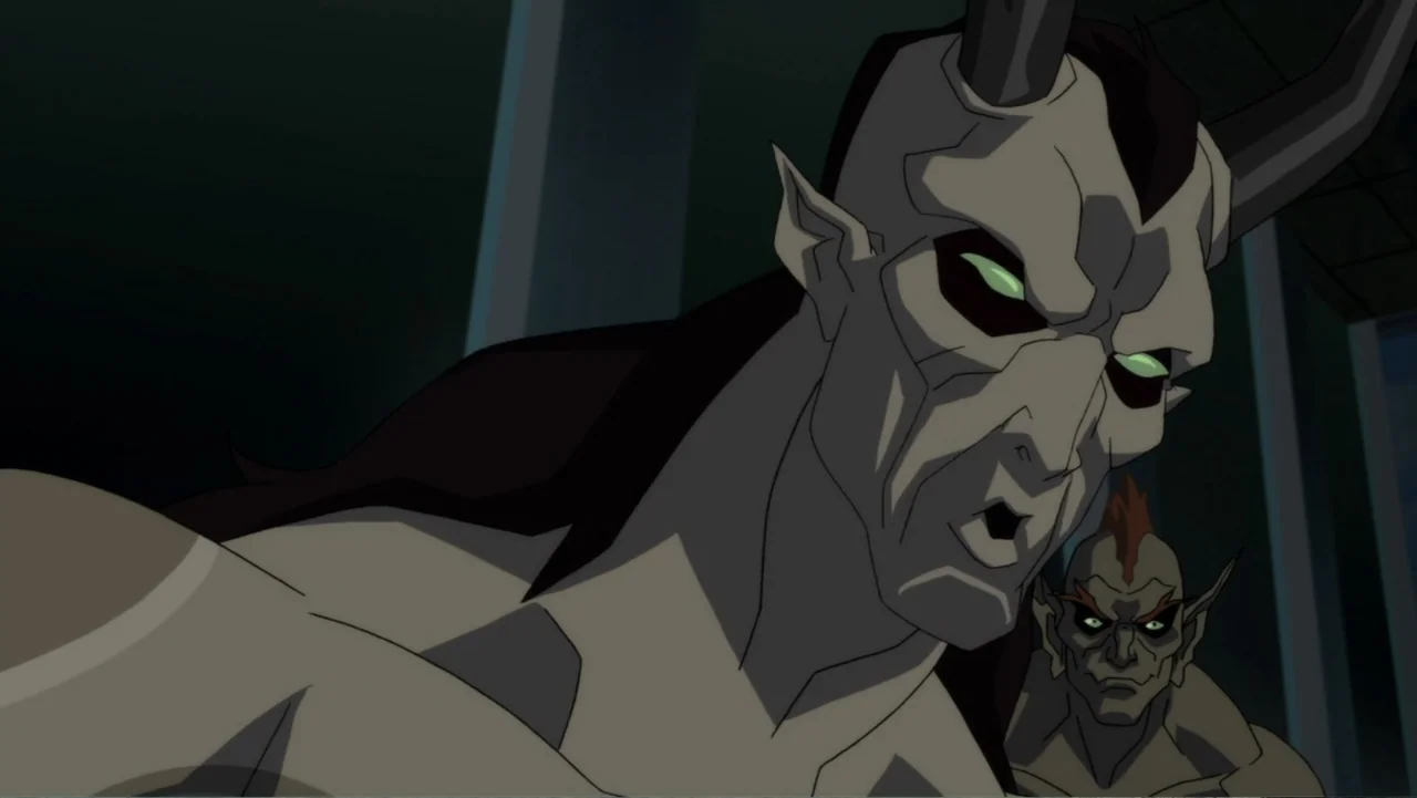 Justice League Dark (2017) movie still: medium — A dimly lit industrial room contains two demonic figures with pale skin and sharp features. A large…