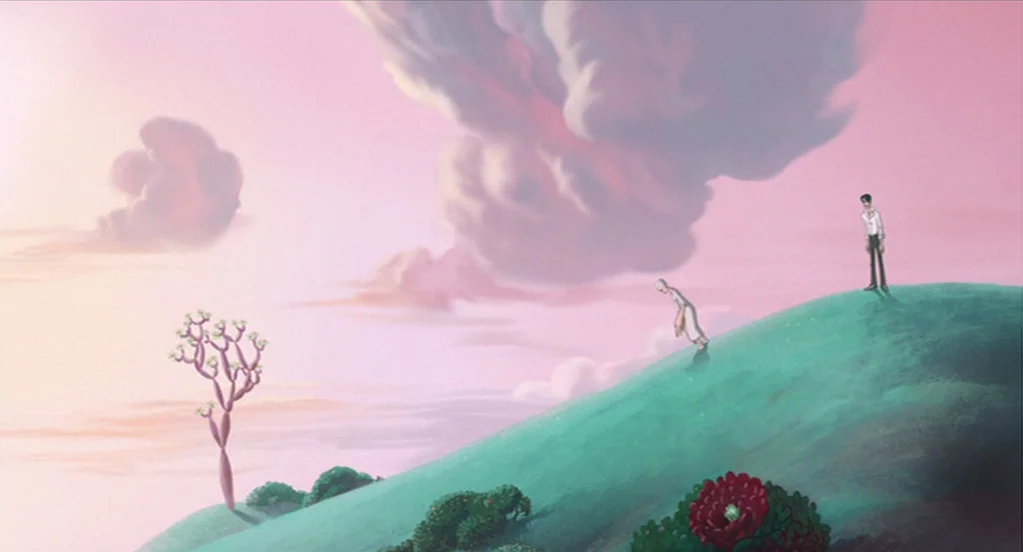 The Congress (2013) movie still: wide — A grassy hill with a singular thin tree and a large red flower. Two figures stand on the slope against a…