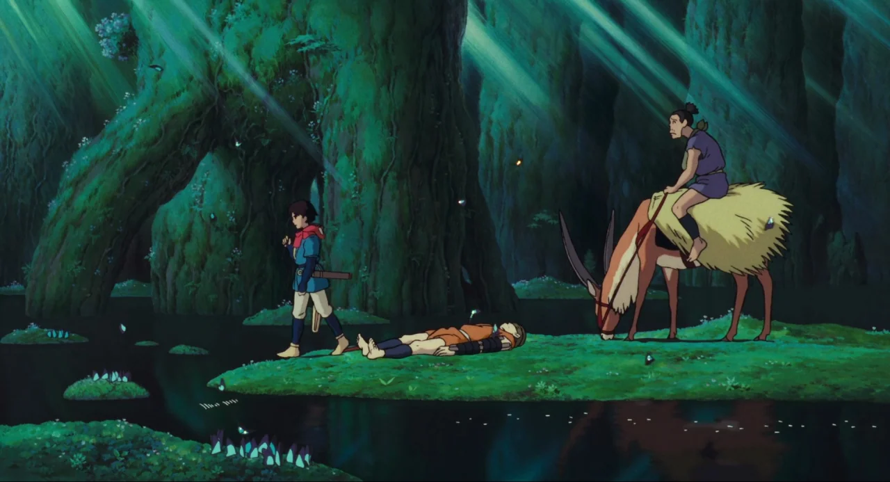 Princess Mononoke (1997) movie still: wide — A dense, moss-covered wetland features large trees and water with glowing small blue plants. A teenager…