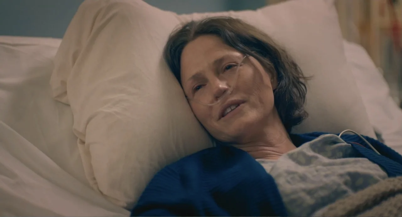 The Map of Tiny Perfect Things (2021) movie still: closeup — A hospital room with a patient lying in a white bed against large pillows. A…