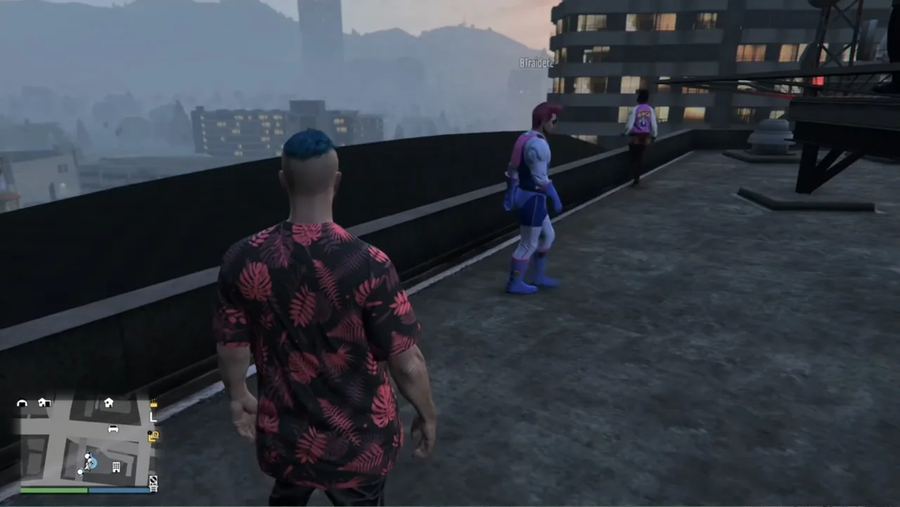 Grand Theft Hamlet (2024) movie still: medium — A flat concrete rooftop overlooks a city skyline during a hazy dusk. A person in a floral shirt…