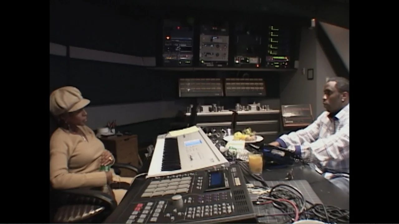 Mary J. Blige's My Life (2021) movie still: medium — A professional recording studio features large sound mixing desks and racks of electronic…
