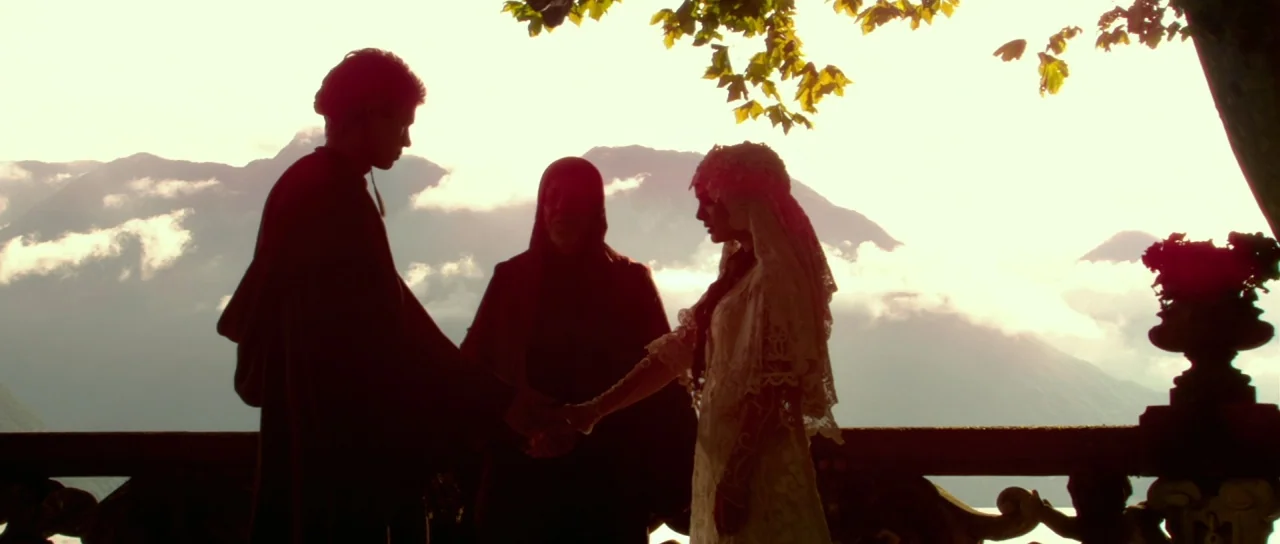 Star Wars: Episode II – Attack of the Clones (2002) movie still: fullbody — A stone balcony overlooks a distant mountain range shrouded in morning…