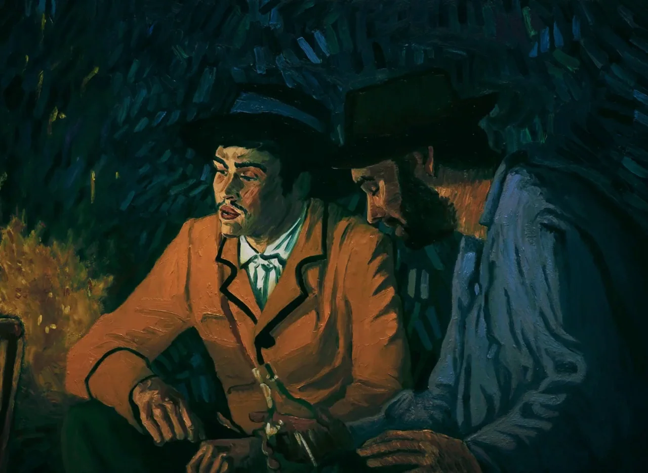 Loving Vincent (2017) movie still: medium — A nighttime scene features two men sitting by a fire in the darkness. The figures are illuminated by the…