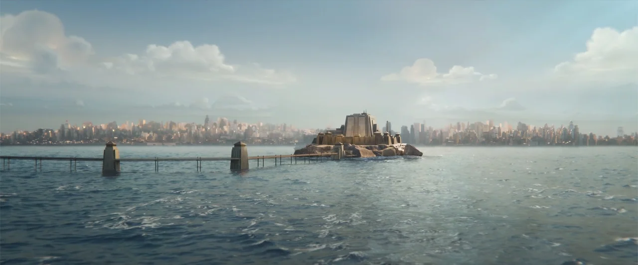 DC League of Super-Pets (2022) movie still: establishing — A fortified building sits on a small rocky island surrounded by open water. A long…