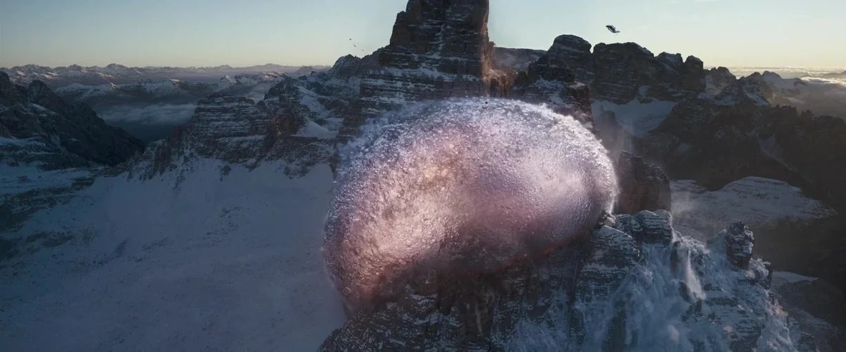 Solo: A Star Wars Story (2018) movie still: establishing — A vast, rugged mountain range sits under a clear sky during the daytime. A large,…