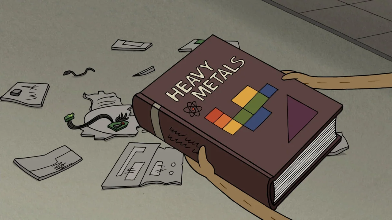 Regular Show: The Movie (2015) movie still: closeup — A plain gray floor is cluttered with scraps of paper and small electronic components. A brown…