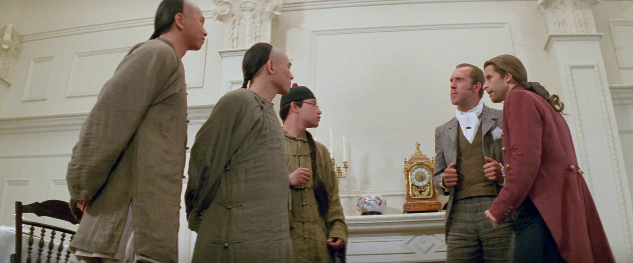 Once Upon a Time in China (1991) movie still: fullbody — A high-ceilinged room with white molding and neoclassical wall panels features a fireplace.…
