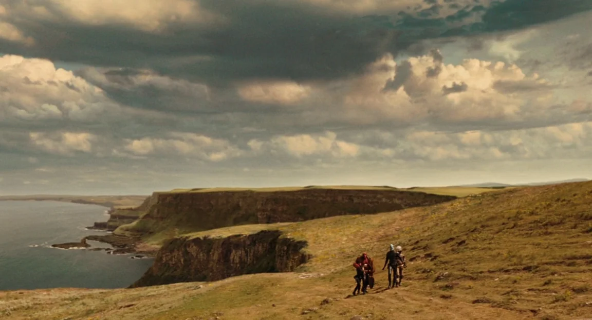 Hellboy II: The Golden Army (2008) movie still: wide — An expansive coastal landscape features steep cliffs dropping into the dark ocean below. A…