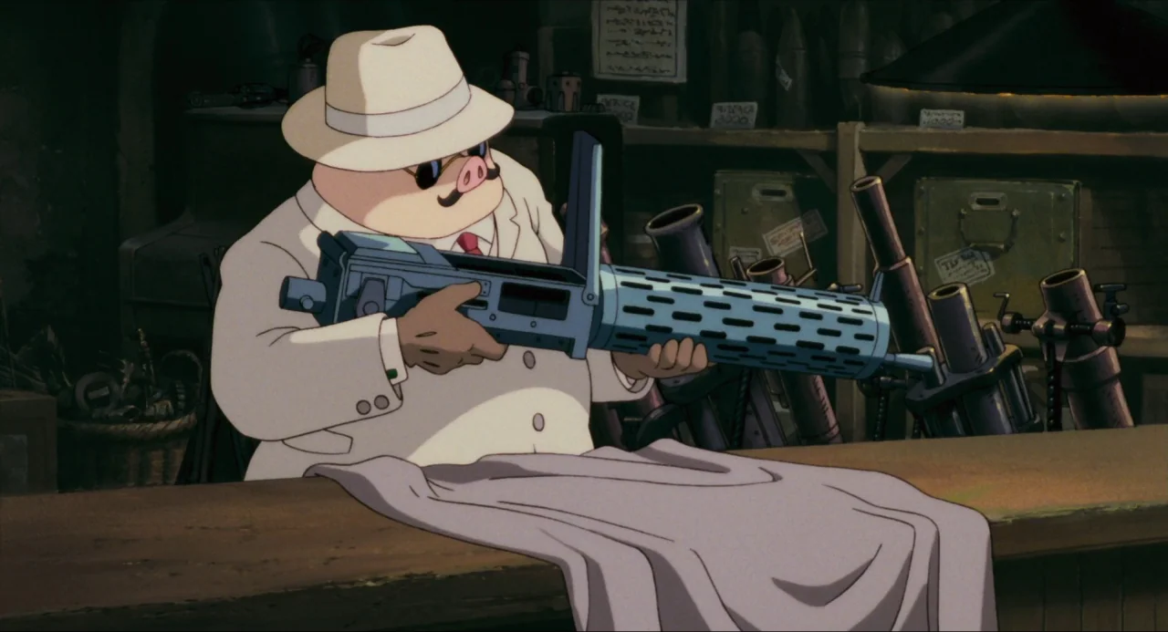 Porco Rosso (1992) movie still: medium — A dimly lit shop interior features shelves stacked with various metal artillery components. An…