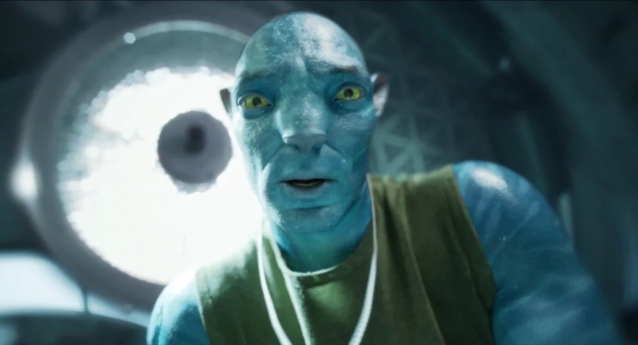 Avatar: The Way of Water (2022) movie still: closeup — A sterile medical environment features a large circular light fixture in the background. A…