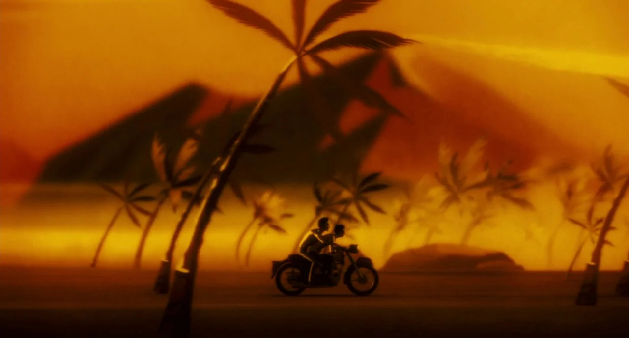 Howl (2010) movie still: wide — A flat tropical plain is filled with silhouetted palm trees against a bright orange sky. Two figures ride a…
