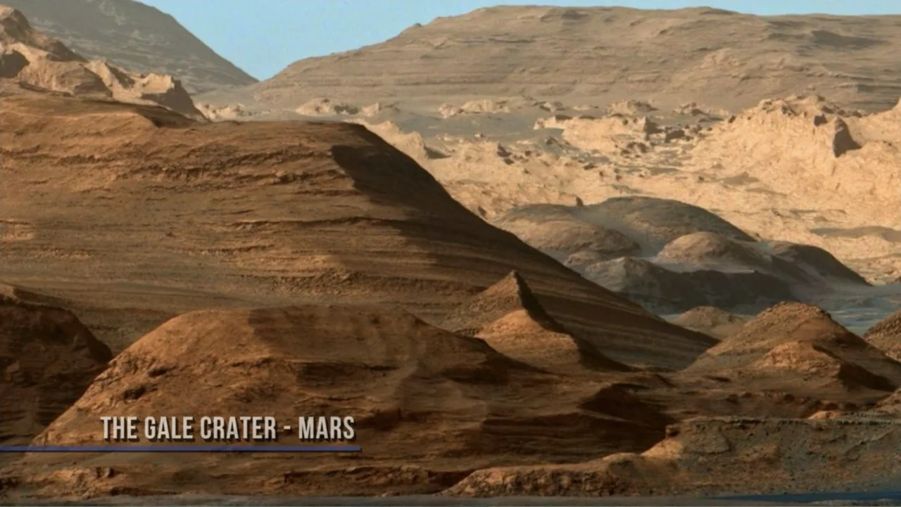 Chesley Bonestell: A Brush with the Future (2018) movie still: establishing — A vast, arid Martian landscape features layered sediment mounds and…