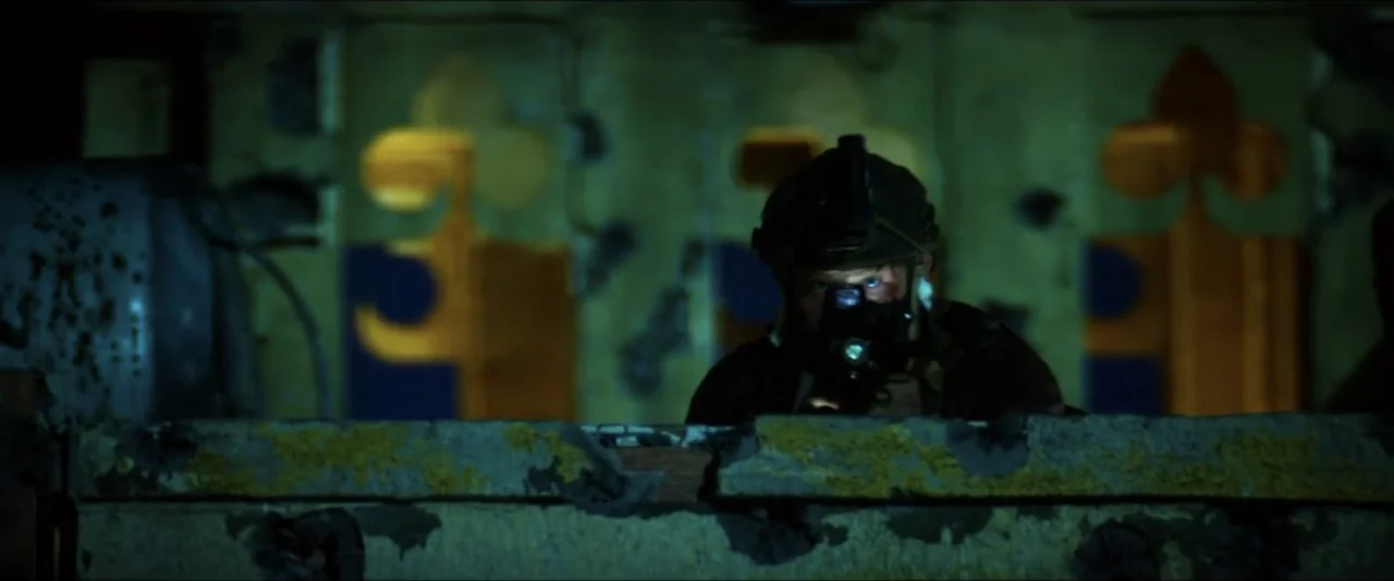 13 Hours: The Secret Soldiers of Benghazi (2016) movie still: medium — A dark, dilapidated interior space features crumbling walls and decorative…