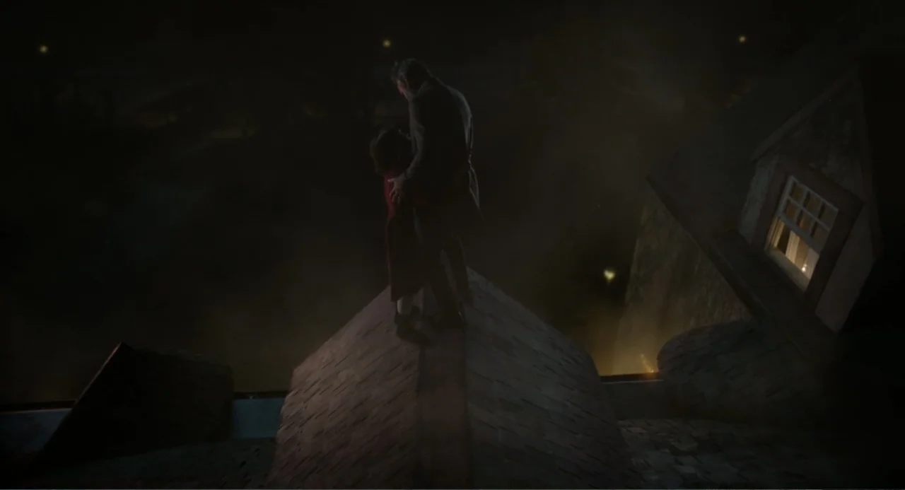 Orphan: First Kill (2022) movie still: wide — A dark, peaked slate roof at night with a glowing window nearby. A man and a child stand together on…