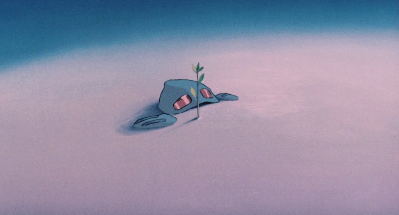 Nausicaä of the Valley of the Wind (1984) movie still: wide — A vast, flat, snowy expanse under a clear, pale sky. A small mechanical creature sits…