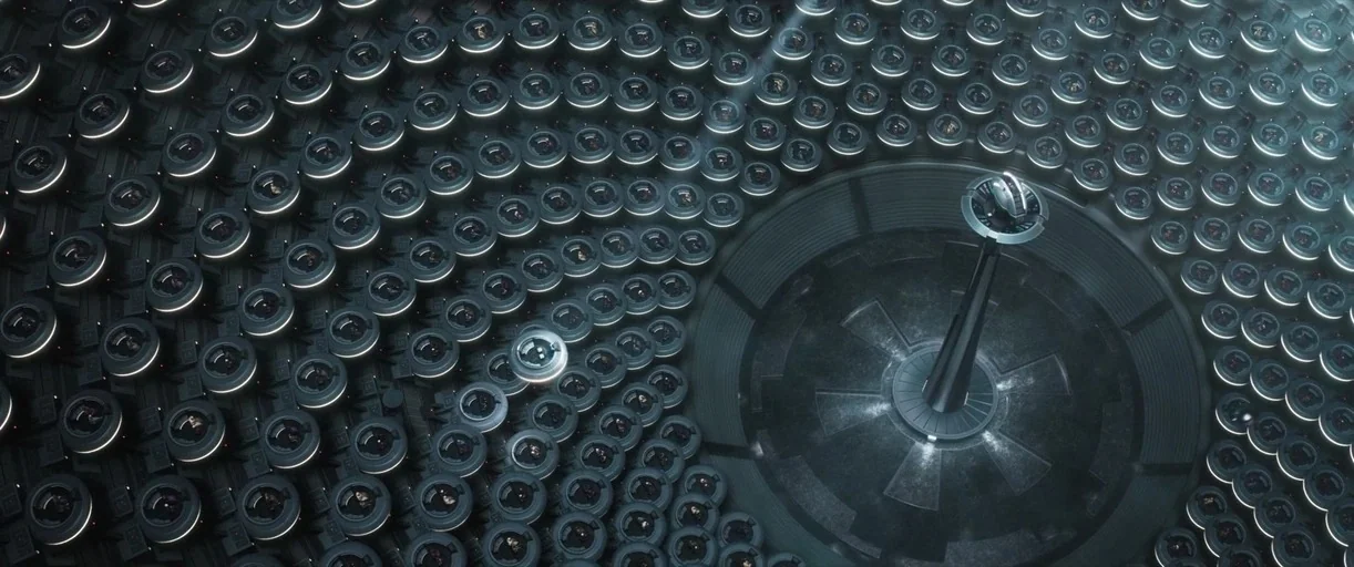 Andor (2022) movie still: establishing — A massive, futuristic circular hall features hundreds of uniform floating pods arranged in concentric…