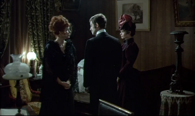The Thief of Paris (1967) movie still: medium — A nineteenth-century parlor features dark wood paneling, ornate curtains, and framed landscape…