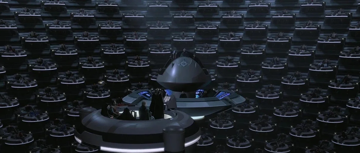 Star Wars: Episode I – The Phantom Menace (1999) movie still: establishing — A vast circular legislative hall features hundreds of uniform floating…