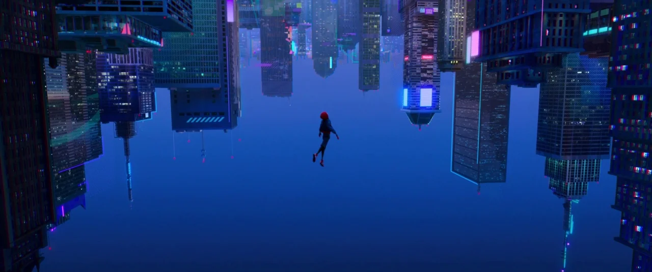 Spider-Man: Into the Spider-Verse (2018) movie still: wide — A dense urban environment is oriented upside down against a deep blue night sky. A lone…