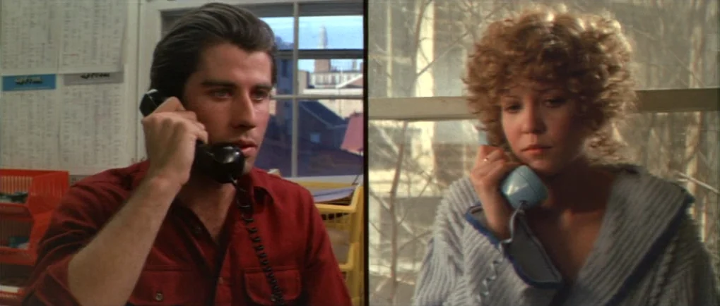 Blow Out (1981) movie still: medium — Split screen showing two individuals located in separate settings communicating via landline telephones. Both…