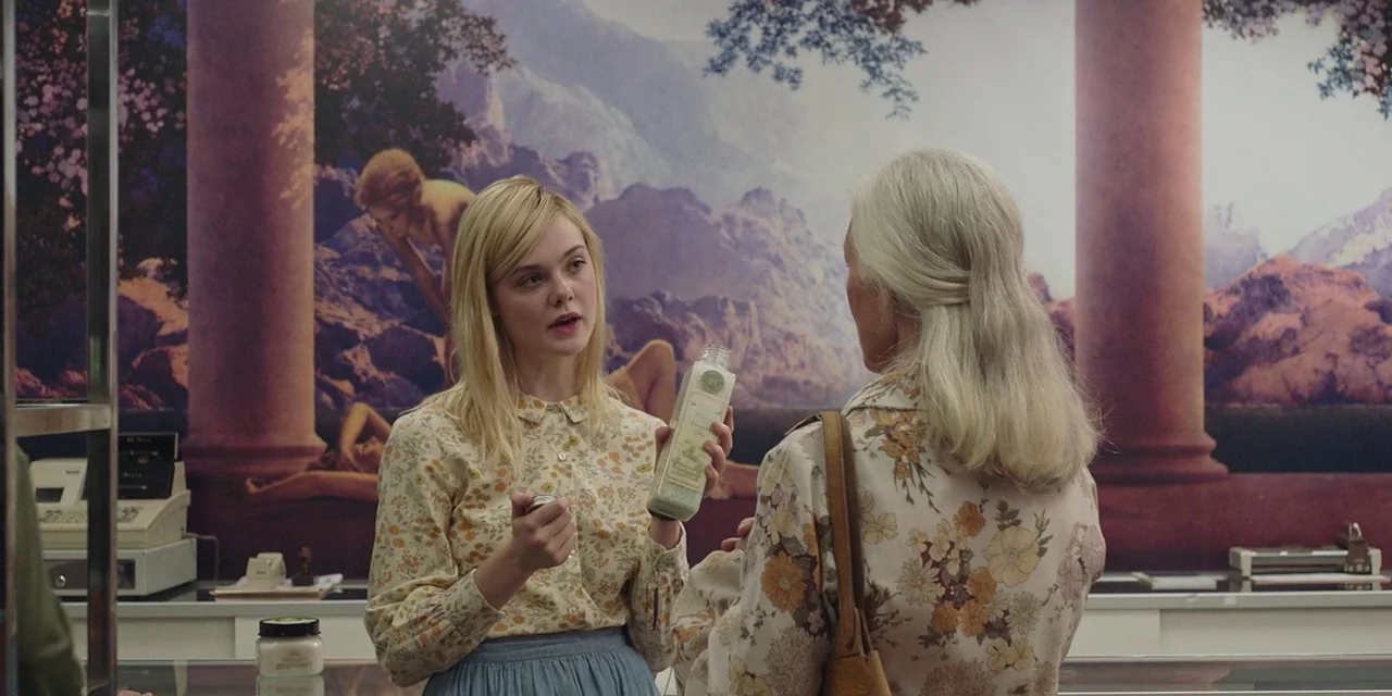 20th Century Women (2016) movie still: medium — A shop interior features a large wall mural of neoclassical figures on a mountain. A young woman…