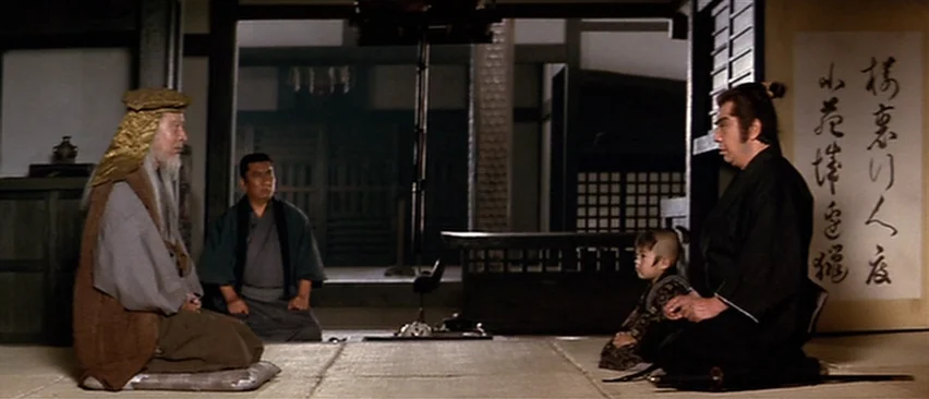 Lone Wolf and Cub: Baby Cart in Peril (1972) movie still: wide — A traditional Japanese room features tatami mats and paper partitions with wooden…