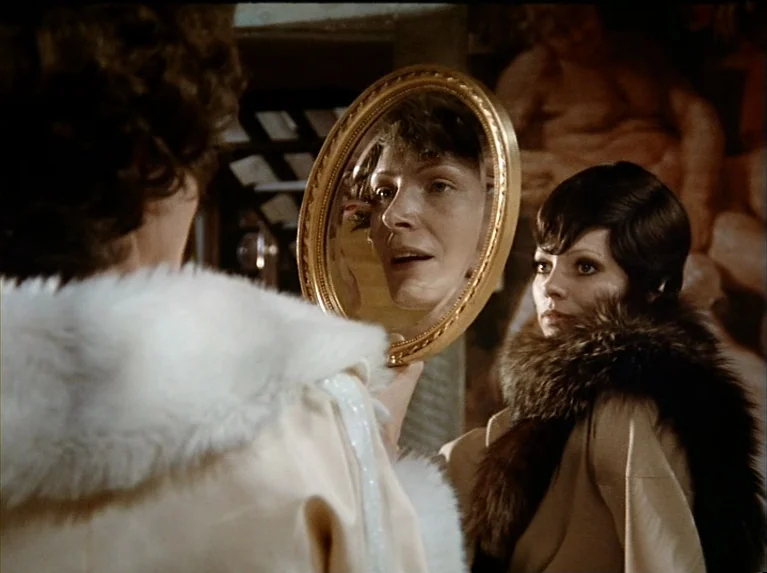 The Bitter Tears Of Petra Von Kant (1972) movie still: medium — Two women in 1920s attire stand in a room decorated with classical art. One woman…