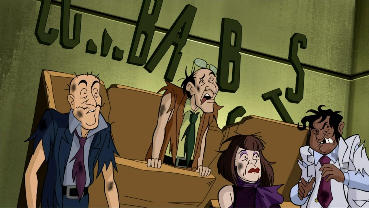 Scooby-Doo! Mask of the Blue Falcon (2012) movie still: medium — An interior space features large wooden crates against a green wall with cut-out…