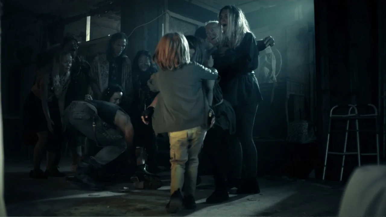 Shadow Master (2022) movie still: medium — A dark, dilapidated interior space features debris and a metal walker in the corner. A young child with…