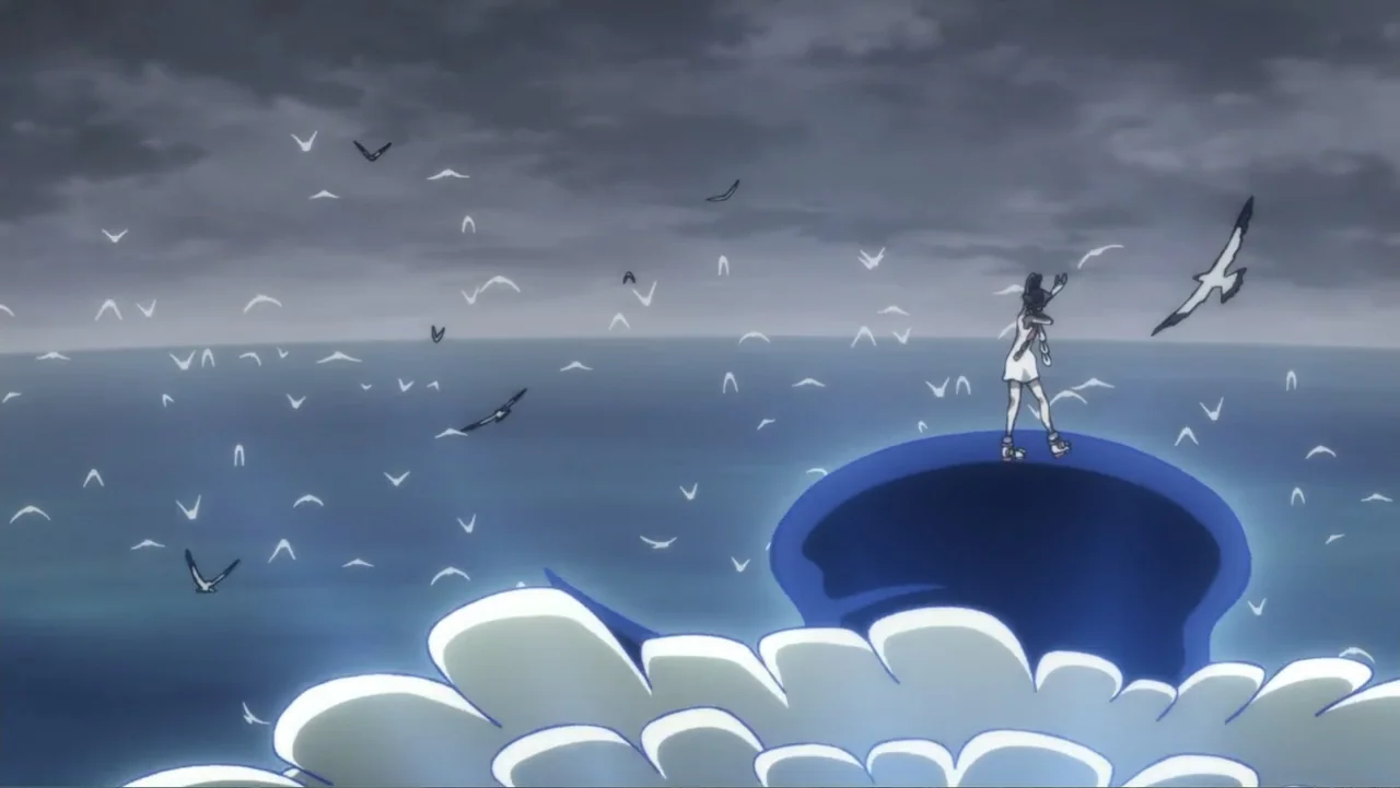 One Piece Film Red (2022) movie still: wide — An endless grey ocean stretches toward a horizon under a dark overcast sky. A lone person in a white…