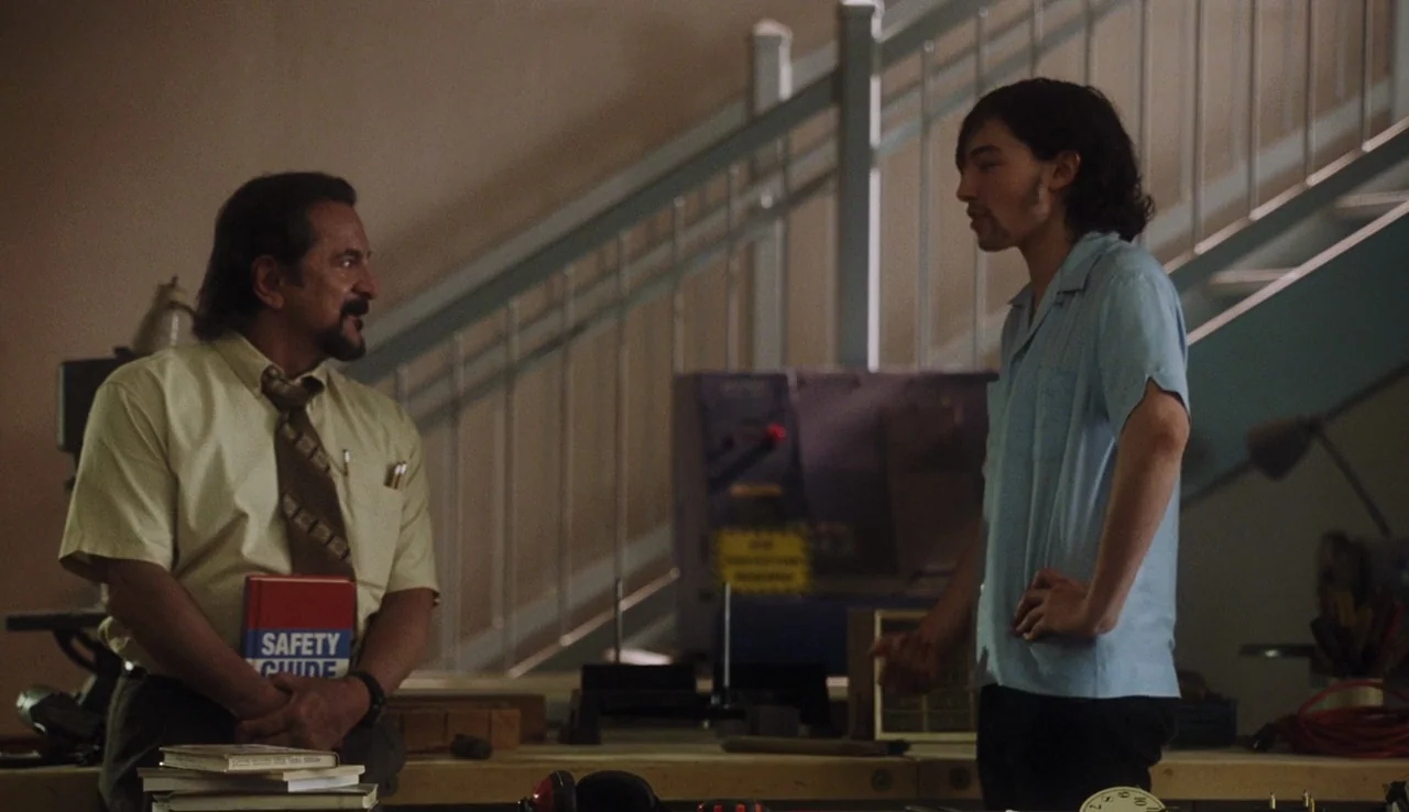 The Perks of Being A Wallflower (2012) movie still: medium — A workshop interior features a staircase with railings and various tools on benches.…