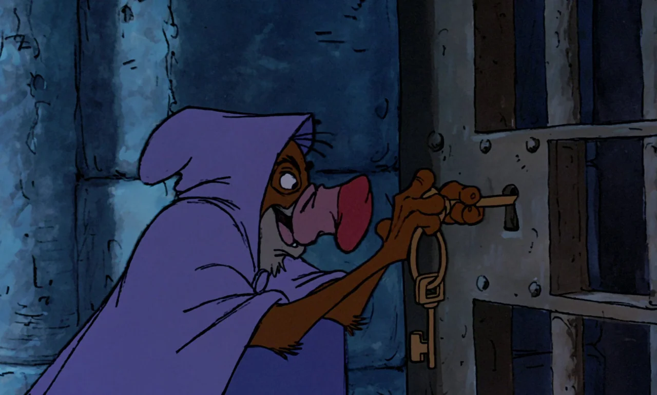 Robin Hood (1973) movie still: medium — A dark stone wall sits behind a figure in a cloak. An anthropomorphic dog inserts a large iron key into a…