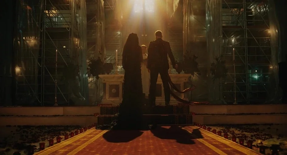Venom Let There Be Carnage (2021) movie still: wide — A church undergoing renovation with scaffolding and plastic sheeting surrounding the central…