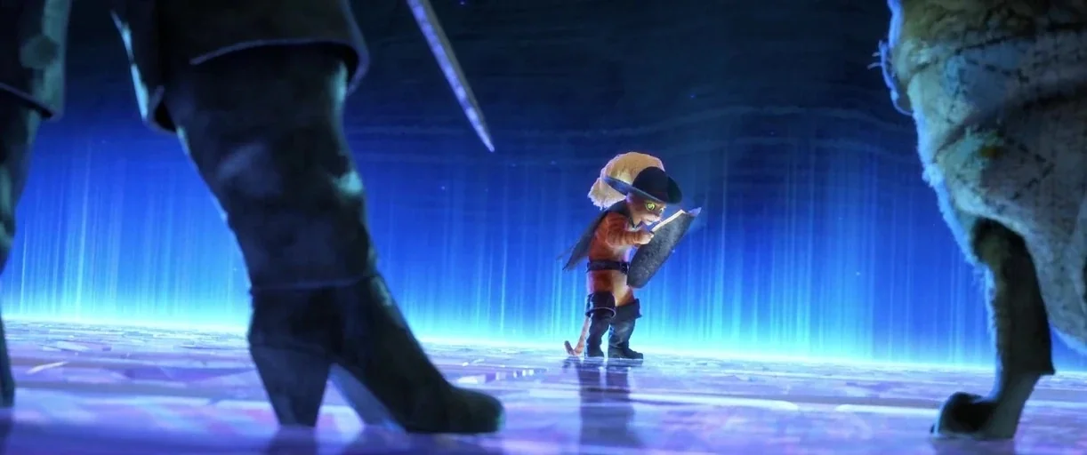 Puss in Boots: The Last Wish (2022) movie still: wide — A dark subterranean space is illuminated by vibrant vertical stripes of glowing blue energy.…
